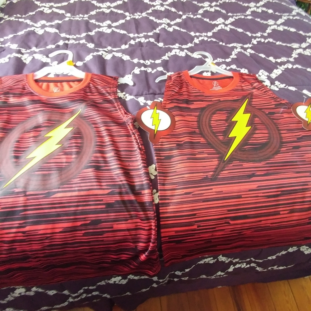 2 New boys tank tops with lightning bolt on front